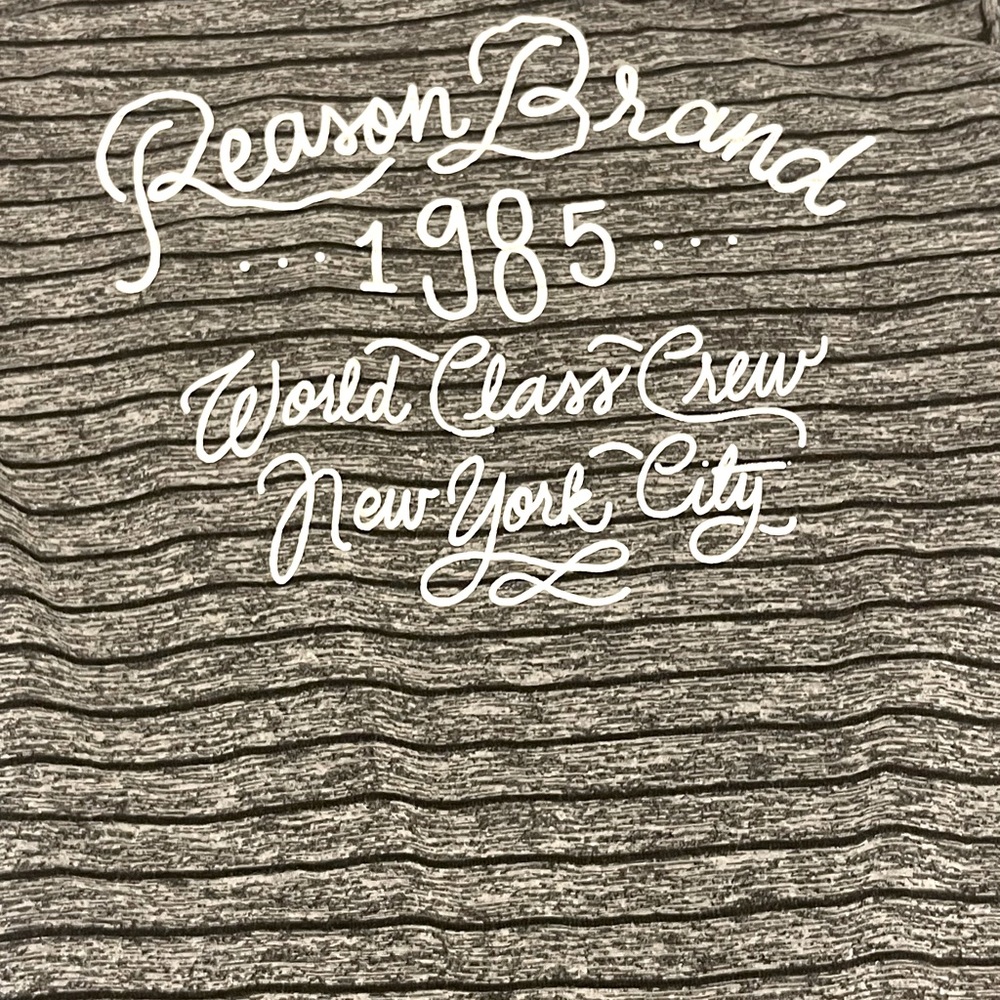 Reason brand T-shirt.